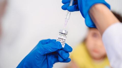 Covid vaccine being administered