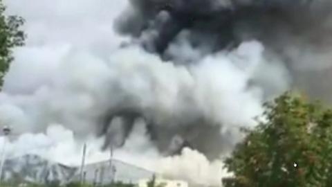 Smoke from the fire at a recycling plant