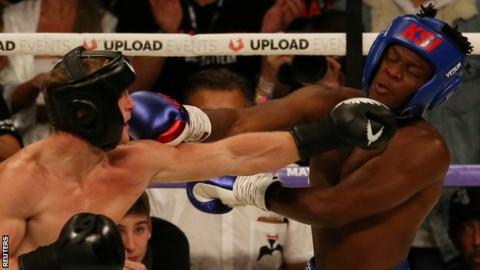 Logan Paul (left) and KSI (right) in action during Saturday's fight at Manchester Arena