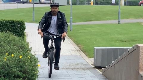 Student on University of Bolton bike