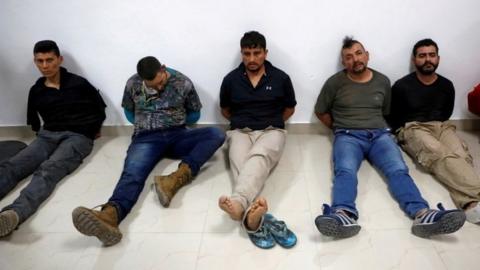 Suspects in the assassination of President Jovenel Moise, who was shot dead early Wednesday at his home, are shown to the media in Port-au-Prince, Haiti July 8, 2021.