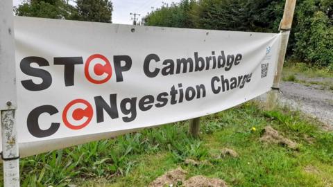 No Cambridge Congestion Charge banner at side of road