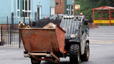 Workmen at Abbey Lane Primary School in Sheffield