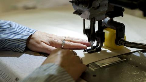 File pic shows a French seamstress in Blanc des Vosges