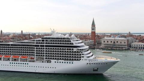 The MSC Magnifica cruise ship is seen from San Maggiore's bell tower leaving in the Venice Lagoon on June 9, 2019.