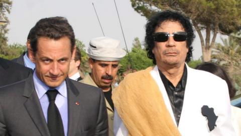 Ex-French President Nicolas Sarkozy (L) with Gaddafi in Libya in Tripoli, 25 Jul 07