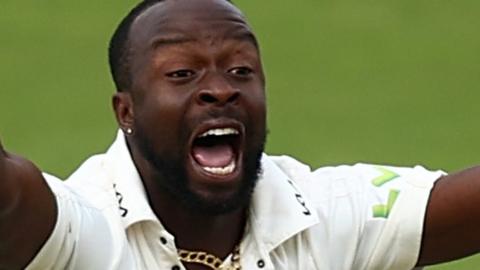 Kemar Roach playing cricket for Surrey