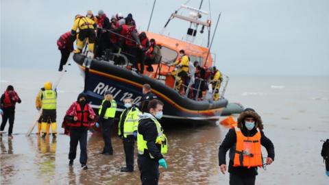 People on life boat arriving on Kent coast