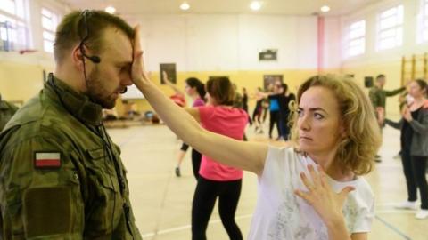 Women take part in a self-defence training class