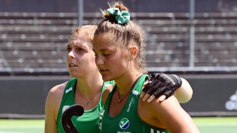 Ireland skipper Katie Mullan and team-mate Lena Tice show their disappointment after Wednesday's game in Amsterdam