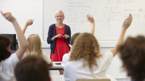 teacher in front of class