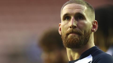 Sam Tomkins in action for England