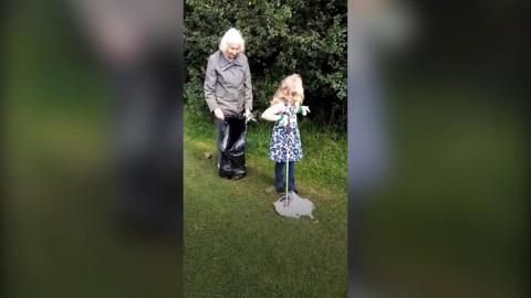 The young girl and her great-grandparents