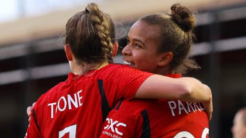 Nikita Parris celebrates with Ella Toone after scoring against Brighton