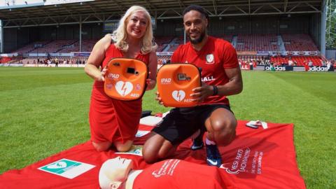 Wales captain Ashley Williams and Welsh Hearts director Sharon Owen