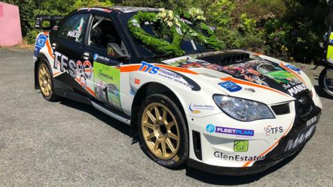 The car driven by Manus Kelly in his Donegal Rally victory led the funeral procession