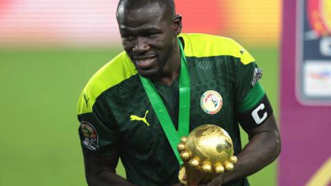 Kalidou Koulibaly with the Africa Cup of Nations trophy