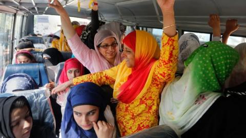 Women in ladies-only bus