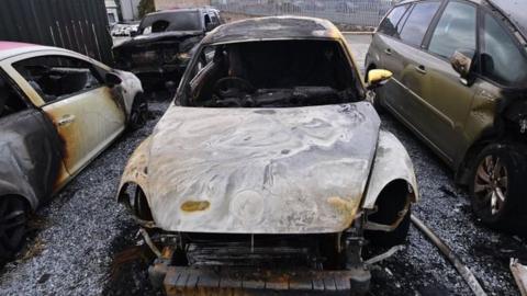 Damaged cars at the scene of a fire in Newtownards
