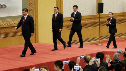 Xi Jinping and other new members of the standing committee take the stage