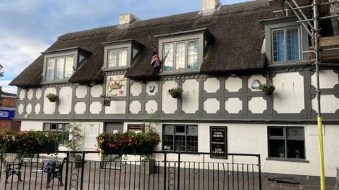 The Crown and Anchor in Stone