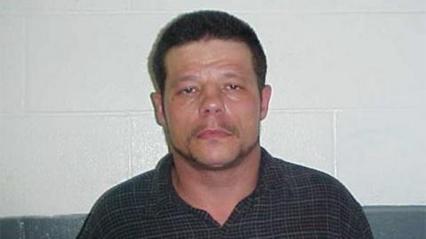 This June 2010 photo provided by the Kay County Detention Center shows Michael Vance, who is suspected in a double killing.