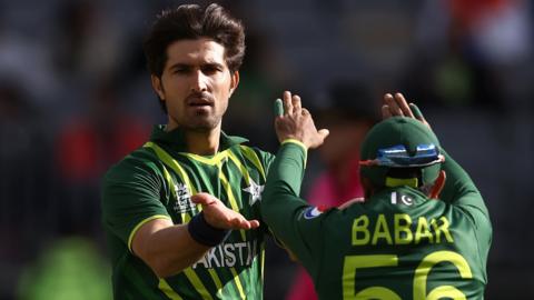 Mohammad Wasim and Babar Azam of Pakistan celebrate a wicket against Netherlands