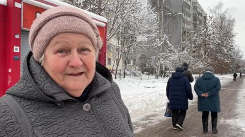 Woman in snowy Russian town