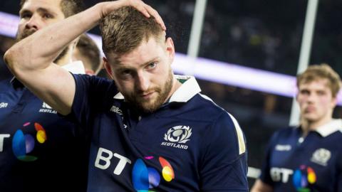 Scotland fly-half Finn Russell and lock Jonny Gray (right) reflect on defeat by England