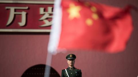 A paramilitary guard stands at the gate of the Forbidden City ahead of the upcoming opening sessions of the Chinese People's Political Consultative Conference (CPPCC) and the National People's Congress (NPC) in Beijing on 1 March 2017