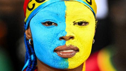 A DR Congo supporter looks on ahead of the Africa Cup of Nations quarter-final against Guinea on 2 February.
