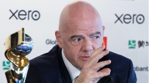 Fifa president Gianni Infantino pictured in Auckland, New Zealand, in front of the Women's World Cup trophy