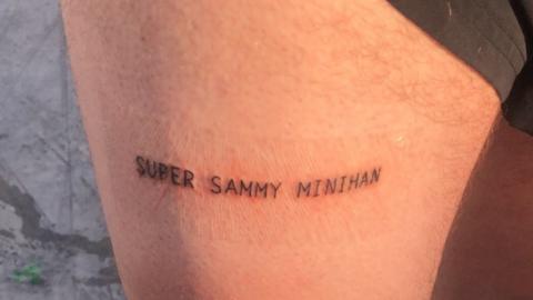 Tattoo of Super Sammy Minihan on man's leg