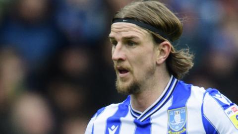 Aden Flint awaits an attack while on loan at Sheffield Wednesday