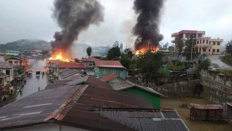 Burning houses in Thantlang, Chin state
