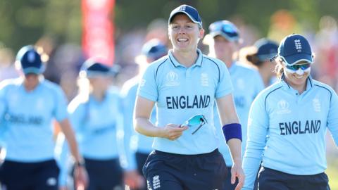 England captain Heather Knight leads her side out