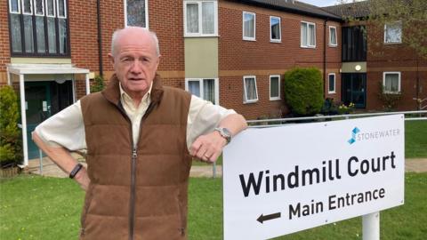 Terence Stanley outside Windmill Court