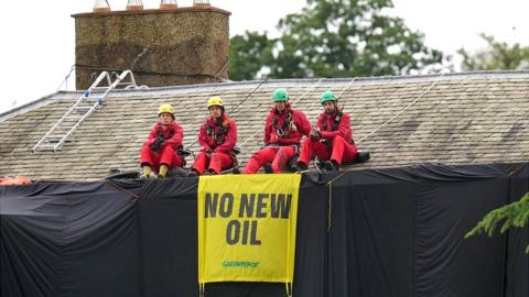 Greenpeace activists on the roof of Prime Minister Rishi Sunak's house