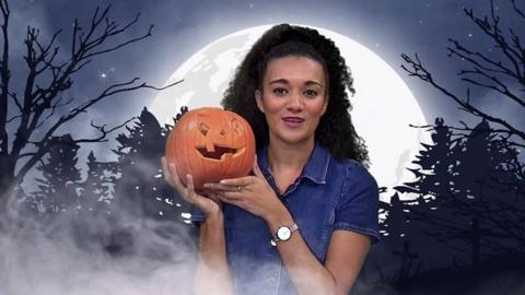 Nina holding a pumpkin