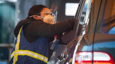 Stock image of Covid drive-thru testing site in Los Angeles