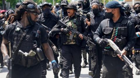 Members and supporters of an all-black militia group called NFAC