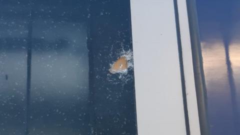 Hole in train window