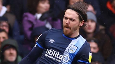 Danny Ward celebrates