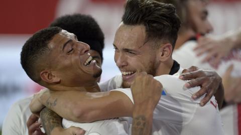 Sevilla celebrate their second goal