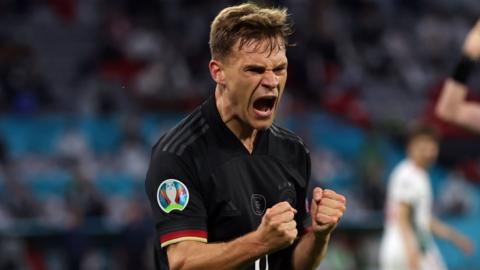 Germanys Joshua Kimmich celebrates after Germany equalise against Hungary at Euro 2020
