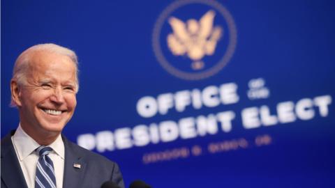 U.S. President-elect Joe Biden smiles as he talks about protecting the Affordable Care Act (ACA) while speaking to reporters about his "plan to expand affordable health care" during an appearance in Wilmington, Delaware, U.S., November 10, 2020