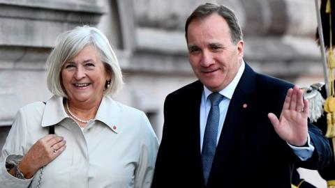 Swedish Prime Minister Stefan Lofven and his wife Ulla arrive at the Swedish parliament, 25 September