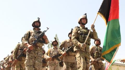 Afghan security forces pictured during a military march