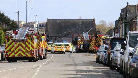 Emergency service vehicles at the scene of the crash