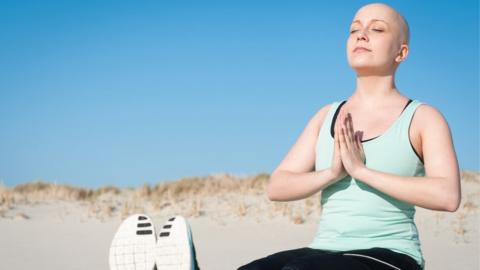 cancer sufferer doing yoga